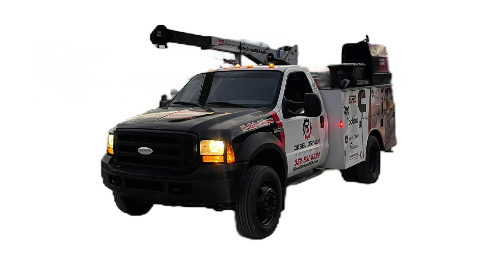 A mobile service truck from Diesel Driven, designed for onsite repairs of heavy equipment. The truck features a black and white design with the company logo, equipped with tools for diesel engine repair.